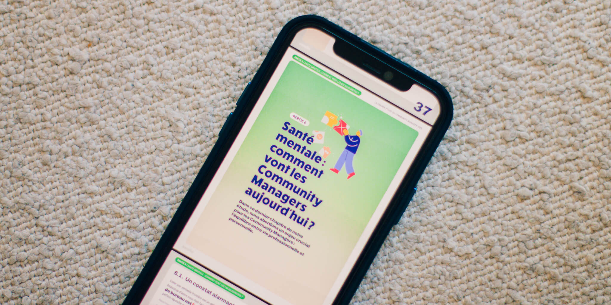 Téléphone qui affiche : « Comment vont les Community Managers aujourd'hui ? »